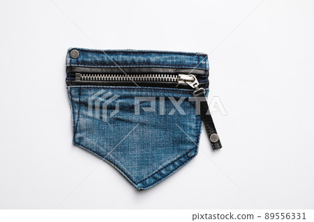 Stylish jeans pocket with zipper isolated on white, top view Stylish jeans pocket with zipper isolated on white, top view 89556331