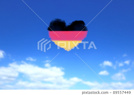 Blue sky with heart-shaped clouds in the color of the German flag Blue sky with heart-shaped clouds in the color of the German flag 89557449