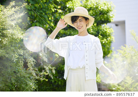 Beauty of a young woman in the green 89557637