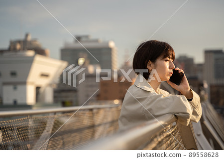 Woman talking outdoors Woman talking outdoors 89558628