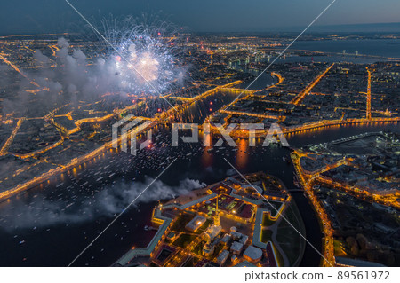 Festive salute over the Peter and Paul Fortress in a significant Victory Day for the country on May 9, improbable quantity of ships observes a show, an eternal flame of memory burns on rostral colons 89561972
