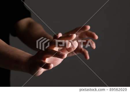 Attacking male hand Attacking male hand 89562020