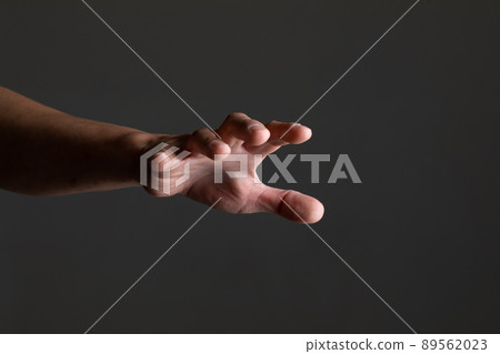Attacking male hand Attacking male hand 89562023