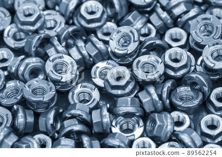 The pile of galvanize special hexagon nuts with anti loos washer. The pile of galvanize special hexagon nuts with anti loos washer. 89562254