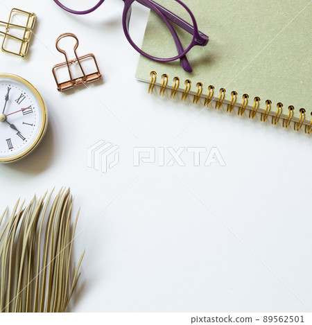 Notebook, glasses, clip, clock on white background. flat lay, top view, copy space Notebook, glasses, clip, clock on white background. flat lay, top view, copy space 89562501