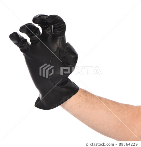 Man wearing black leather glove on white background, closeup. 89564229