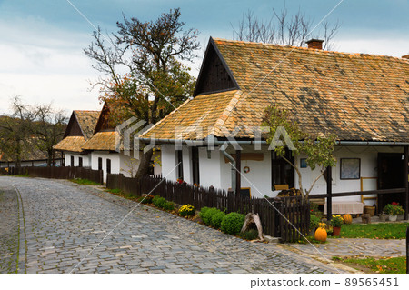 Illustration of view on the streets of traditional hungarian village Holloke 89565451