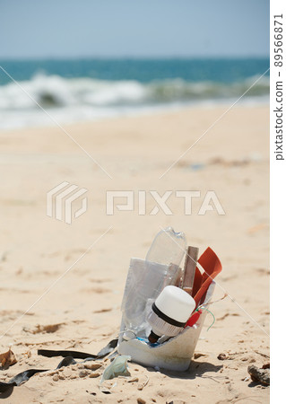 Broken Bucket with Plastic Trash Broken Bucket with Plastic Trash 89566871