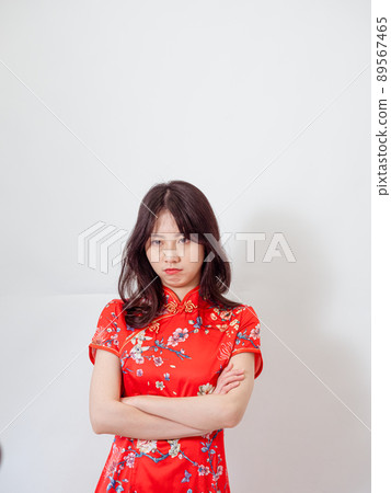 A woman with a traditional flag, a white background, a frontal crossover, and a angry expression by Yoshikazu Watanabe. 89567465