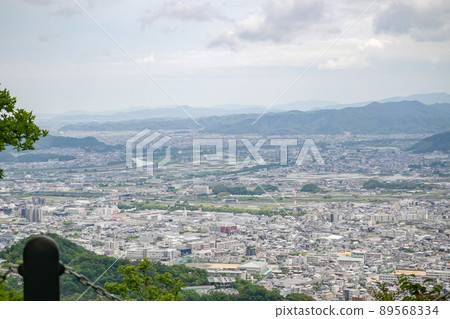 View Tokushima city from the summit of Mt. Bizan in Tokushima city under cloudy weather View Tokushima city from the summit of Mt. Bizan in Tokushima city under cloudy weather 89568334
