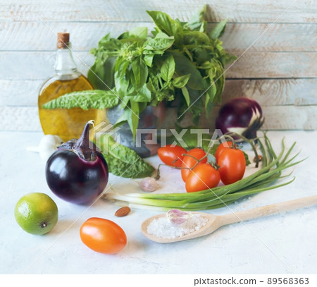 Fresh vegetables and greens in an ecological paper bag, on a light background, organic natural products, healthy eating, home cooking Fresh vegetables and greens in an ecological paper bag, on a light background, organic natural products, healthy eating, home cooking 89568363