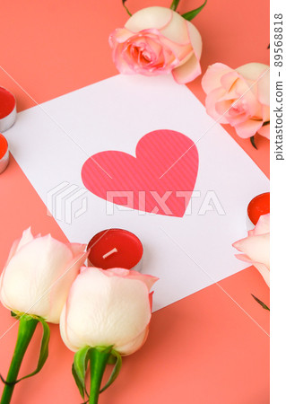 Heart greeting card on paper note. Delicate pink roses on pink background. Minimal trendy composition. Romantic pastel pink rose flowers. Preparation for Valentines day, Mothers day, Womens day Heart greeting card on paper note. Delicate pink roses on pink background. Minimal trendy composition. Romantic pastel pink rose flowers. Preparation for Valentines day, Mothers day, Womens day 89568818