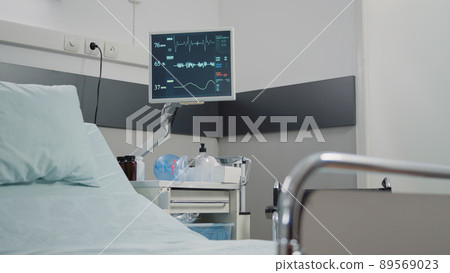 Close up of monitor used to measure heart rate and pulse for healthcare. Nobody in hospital ward with technology and medical instruments for intensive care and patient recovery. 89569023