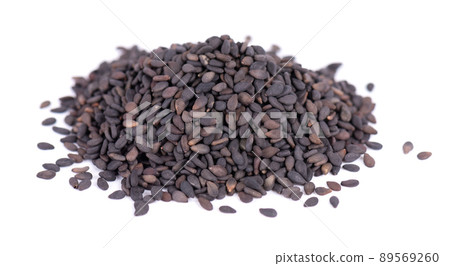 Black sesame seeds isolated on white background. Organic spice. Black sesame seeds isolated on white background. Organic spice. 89569260