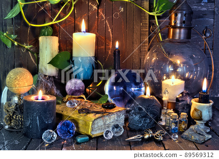 Wicca, esoteric and occult still life with vintage magic objects on witch table altar for mystic rituals and fortune telling. Halloween and gothic concept 89569312