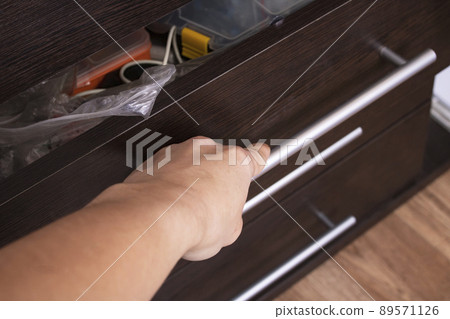 Open drawer of wooden table close up Open drawer of wooden table close up 89571126