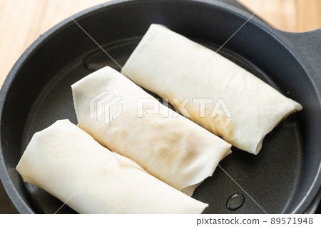 Fried and grilled lumpia with less oil Fried and grilled lumpia with less oil 89571948