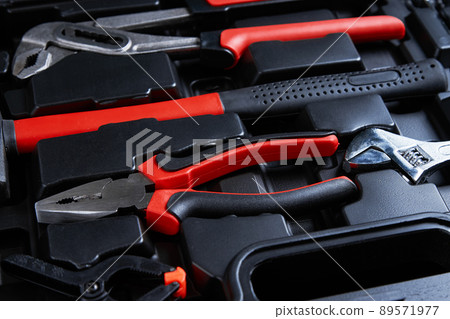 Set of tools for repair and maintenance on black background Set of tools for repair and maintenance on black background 89571977