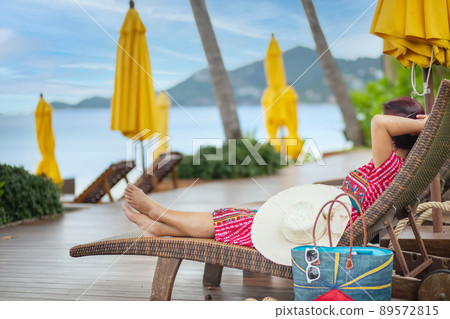 Middle aged woman relaxing at lamai beach in koh samui ,Thailand.. 89572815