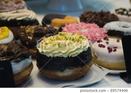 different cakes in the shop window different cakes in the shop window 89574406