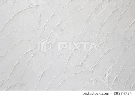 The white walls are plastered with vintage cement. 89574754