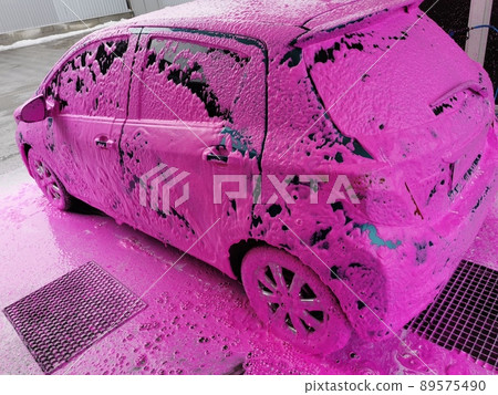 Car wash at home. The car is covered with foam to remove dirt Car wash at home. The car is covered with foam to remove dirt 89575490