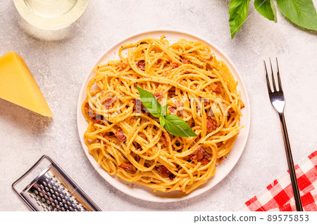 Homemade pasta with pancetta, egg, hard parmesan cheese and cream sauce Homemade pasta with pancetta, egg, hard parmesan cheese and cream sauce 89575853