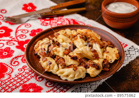 Dumplings, filled with mashed potatoes. 89575862