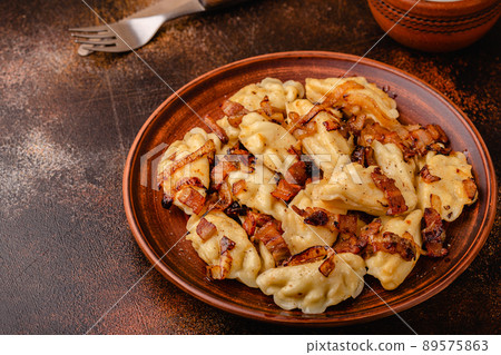 Dumplings, filled with mashed potatoes. 89575863
