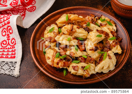 Dumplings, filled with mashed potatoes. 89575864