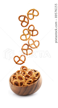 Falling cookie on white backgrounds Falling cookie on white backgrounds 89576155