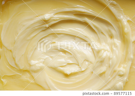 detail shot of fresh butter in a container  89577115