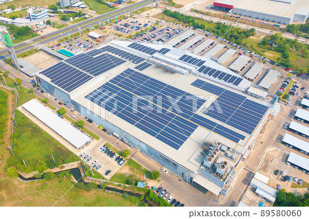 Aerial view of solar panels or solar cells on the roof of shopping mall building rooftop. Power plant, renewable clean energy source. Eco technology for electric power in industry. 89580060