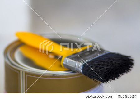 Top view of new shiny clean sealed tin full of red paint and painting brush on it, isolated on white. Tools, materials, building and reconstruction concept. Top view of new shiny clean sealed tin full of red paint and painting brush on it, isolated on white. Tools, materials, building and reconstruction concept. 89580524