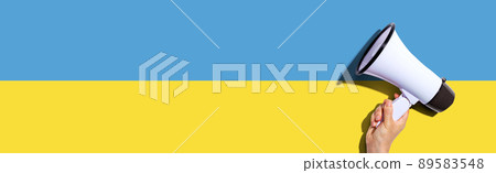 Attention and announcement concept with a megaphone 89583548