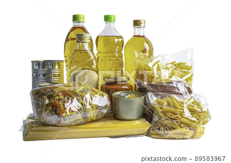 Foodstuff for donation, storage and delivery. Various food, pasta, cooking oil and canned food in cardboard box. Foodstuff for donation, storage and delivery. Various food, pasta, cooking oil and canned food in cardboard box. 89583967
