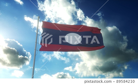 Flag of Laos waving at wind against beautiful blue sky. 3d rendering Flag of Laos waving at wind against beautiful blue sky. 3d rendering 89584210