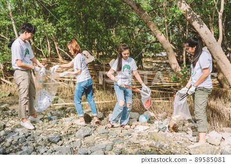 Group of asian diverse people volunteer teamwork ,environment conservation,volunteer help to picking plastic and foam garbage on park area.Volunteering world environment day. 89585081