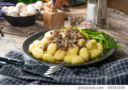 Gnocchi with mushroom sauce. 89585898