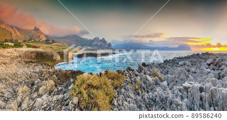 Fabulous evening seascape of Isolidda Beach near San Vito cape. 89586240
