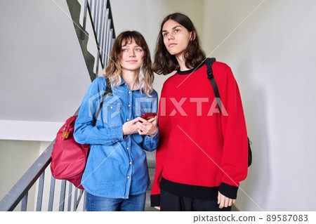 Portrait of a teenage couple of students 17, 18 years old Portrait of a teenage couple of students 17, 18 years old 89587083