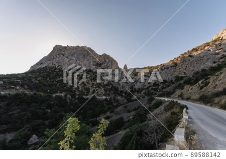 View of Sokol Mountain near town of Sudak in Crimea on Black Sea coast View of Sokol Mountain near town of Sudak in Crimea on Black Sea coast 89588142