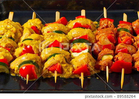 raw marinated meat on wooden skewers, pork, chicken, beef raw marinated meat on wooden skewers, pork, chicken, beef 89588264
