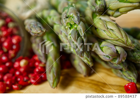 Fresh Young Asparagus closeup. Asparagus on wood board 89588437