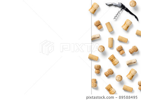 wine corks creative flat lay layout on a white backlit background. flatlay creative wine set with corks and corkscrew for design concept. wine corks creative flat lay layout on a white backlit background. flatlay creative wine set with corks and corkscrew for design concept. 89588495