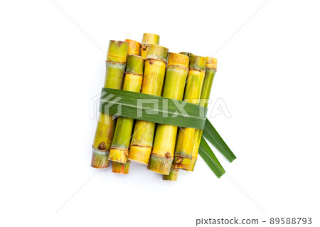 Sugar cane on white background. Sugar cane on white background. 89588793