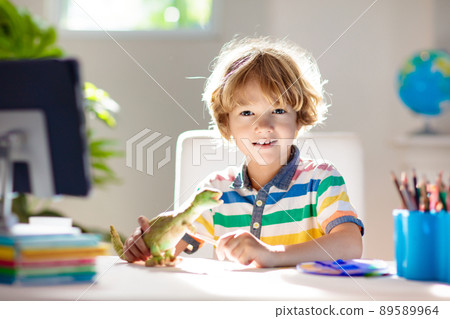 Online remote learning. School kids with computer. 89589964