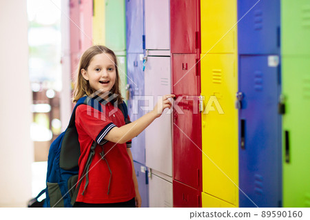 Student in school at locker. Kids in preschool. 89590160
