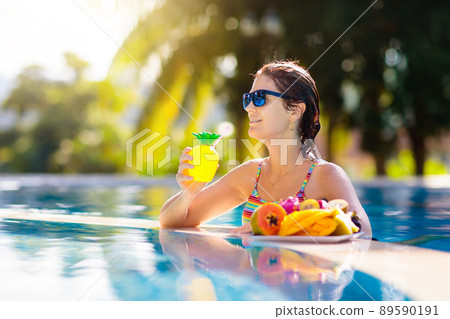 Tropical fruit at swimming pool Tropical fruit at swimming pool 89590191