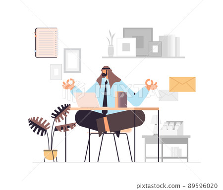 arab businessman sitting lotus pose at workplace business man doing yoga exercise meditation relaxation concept 89596020